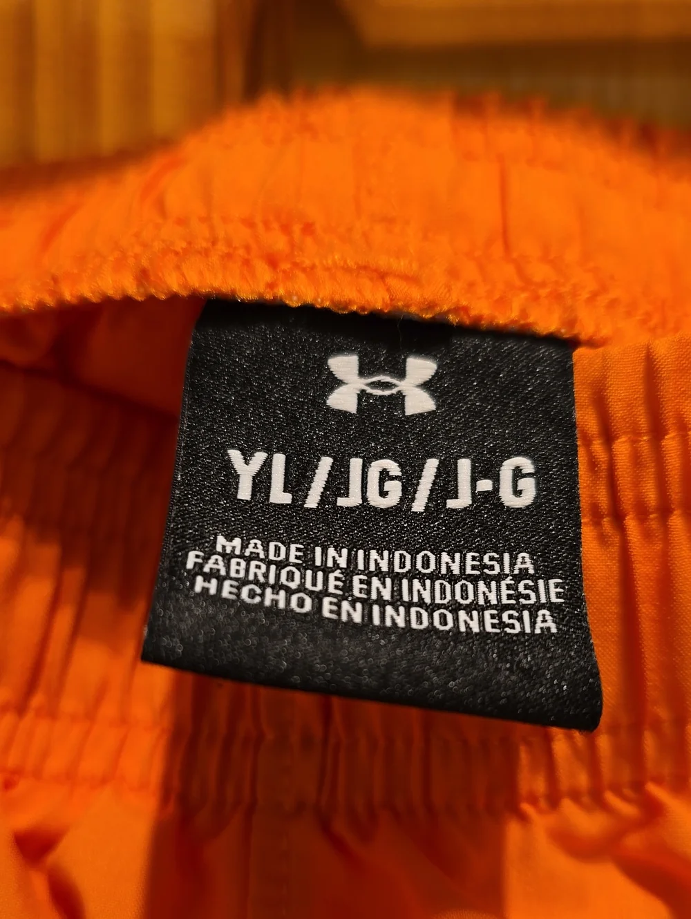 Under Armour Youths Large Bright Orange Athletic Shorts